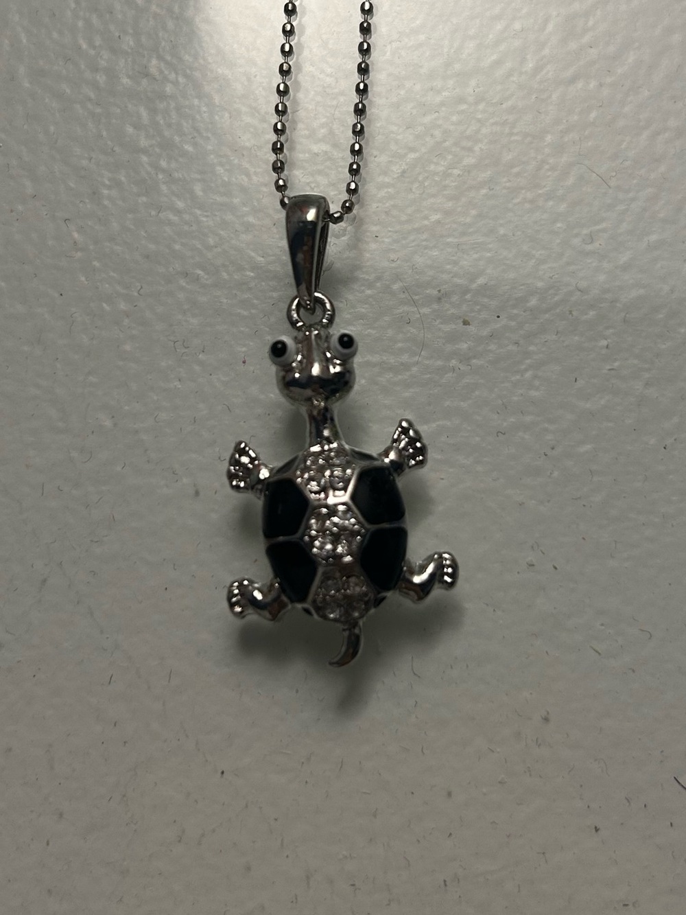 Silver Turtle Pendant Necklace with Black Enamel